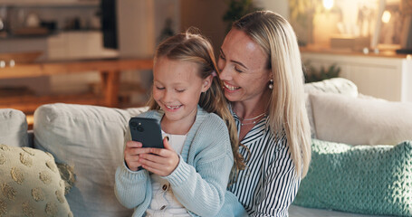 Home, mother and girl with cellphone, smile and bonding together with online entertainment. Happy...