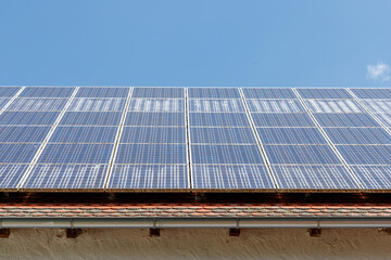 Rooftop Solar Panels on Tiled Roof with Gutter