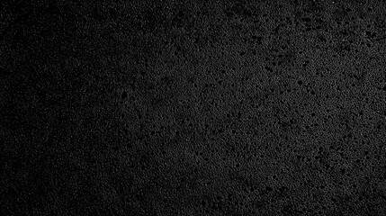 Fototapeta premium Black foam rubber texture background with a rough surface