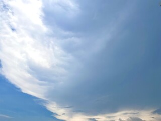 Beautiful round clouds after the rain, under a gloomy sky, big, Soft, round clouds floating in the moody sky 