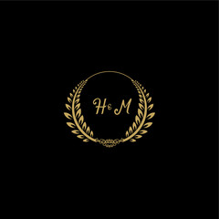 Fototapeta premium HM beautiful, feminine and elegant wedding monogram initial logo with circle floral gold
