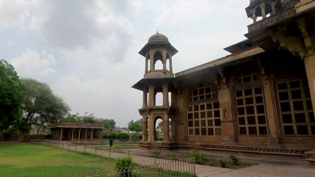 Pan shot of The Tomb of Tansen and Mohammad Ghaus is of typical Mughal architectural style in Gwalior, a Sufi saint in Gwalior, Madhya Pradesh, India