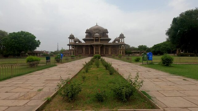 Wide angle shot of The Tomb of Tansen and Mohammad Ghaus is of typical Mughal architectural style in Gwalior, a Sufi saint in Gwalior, Madhya Pradesh, India