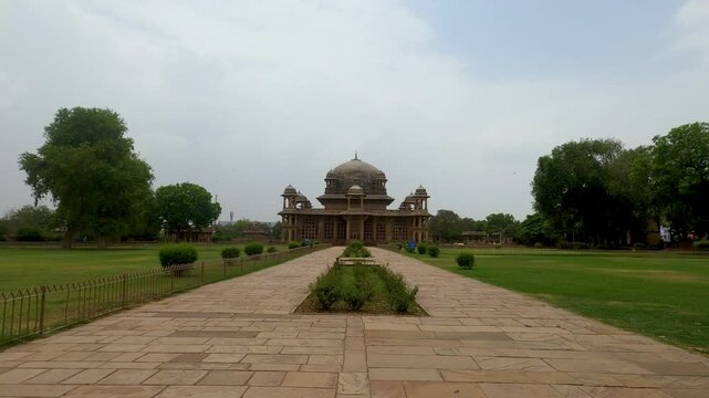 Wide angle shot of The Tomb of Tansen and Mohammad Ghaus is of typical Mughal architectural style in Gwalior, a Sufi saint in Gwalior, Madhya Pradesh, India
