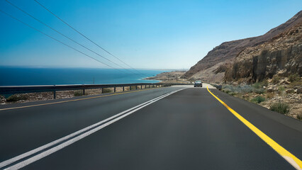 driving on the road near the Dead Sea