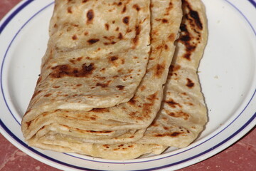 A close-up of the traditional Moroccan flatbread known as msemmen or msemen