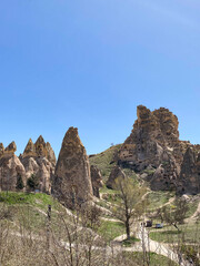 Uchisar Castle or Kalesi, a unique cave building, carved from volcanic rock at the highest point of...