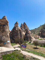 Uchisar Castle or Kalesi, a unique cave building, carved from volcanic rock at the highest point of...