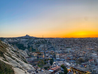 Panorama view of fairy chimneys and the red valley on a beautiful sunset in Goreme, Cappadocia 