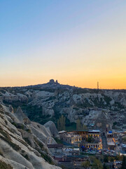 Panorama view of fairy chimneys and the red valley on a beautiful sunset in Goreme, Cappadocia 