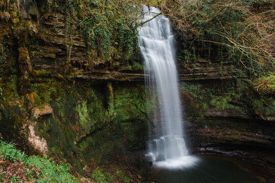 Immortalised by the poetry of W.B. Yeats, Glencar Waterfall, County Leitrim, Ireland. Scenic waterfall, lush greenery, natural beauty, tranquil woodland, tourist attraction, Irish landscape