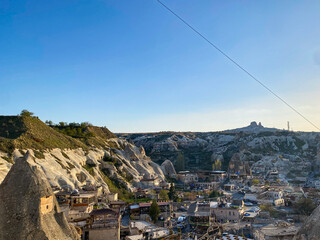 Aerial and panoramic view of cave houses and hotels in Goreme, Cappadocia - the unique natural rock...