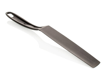 One plastic pancake spatula isolated on white background, close-up.