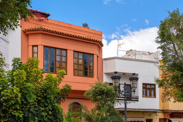 Agüimes, Gran Canaria under a bright summer sky. The architecture of Agüimes blends traditional Canarian style with colorful, vibrant facades.