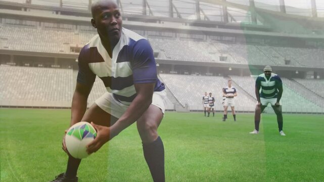 Scrum half placing rugby ball on pitch, snapping wrists launching pass to backline during training
