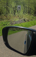 A road sign from the Bieszczady Mountains, Poland showing a bear with the inscription: Slow down, bears.