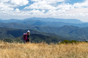 Solo Female Hiker on Razorback Walking Track, Mount Feathertop – Scenic Alpine Trail in Victoria, Australia