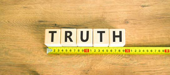 Truth symbol. Concept word Truth on beautiful wooden blocks. Beautiful wooden table wooden background. Beautiful yellow ruler. Business lifestyle truth concept. Copy space.