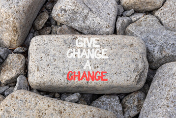 Give change a chance symbol. Concept words phrase Give change a chance on beautiful grey stone....