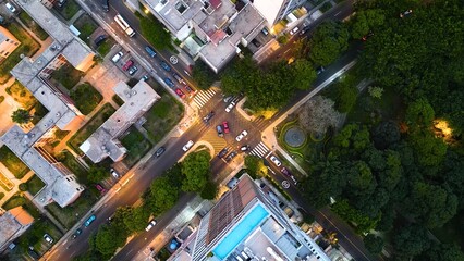 Top-down drone view of an avenue intersection in Lince district, Lima, on a quiet night.