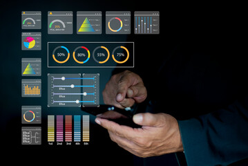 Businessman analyst manages the system database, and analysis data plans, and reports GDP marketing KPI sale. shows a dashboard chart. analytics business concept