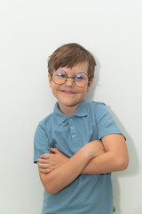 Little Boy in Blue Polo T-shirt on White Background, Child Student in Round Glasses