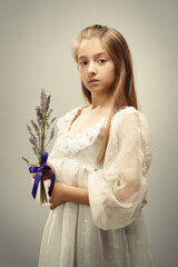 Young Girl Holding Lavender