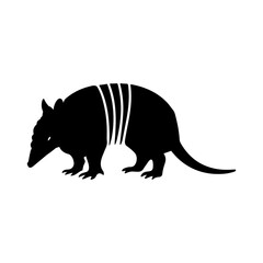 Silhouette of an armadillo with distinct shell bands and a long tail in a side profile view image