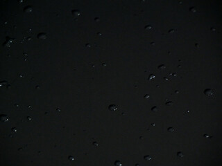 Small water drops on a dark surface. Overlay background wallpaper. Luxury Texture Design. Stylish fashion backdrop. 