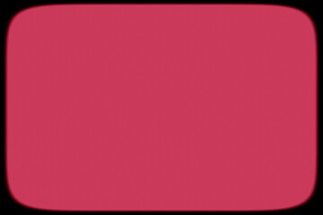 Pink background in black frame, blurred background.