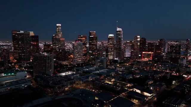 Nighttime Reverse Aerial Shot of Downtown Los Angeles Skyline
