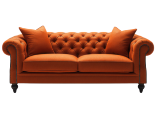 A large orange couch with pillows on it