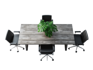 A wooden table with four black chairs and a large plant in the middle