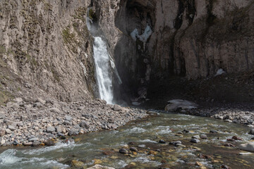 View of Karakaya-Su waterfall cascading down a steep rocky cliff. Ecotourism, outdoor adventure, nature preservation, travel destinations