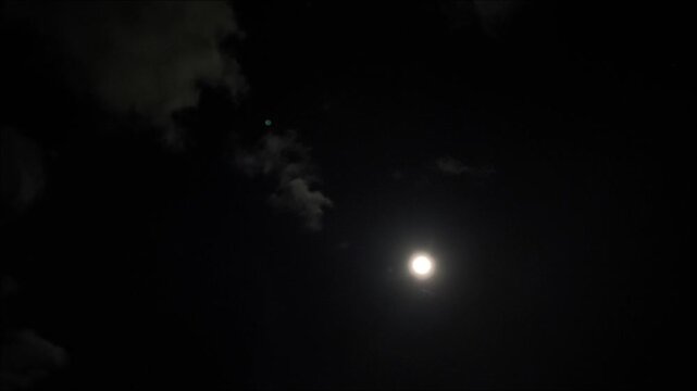 The big cloud is covering the all sky with the moon