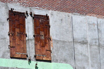 Historical loading doors. Old weights attached to doors. 