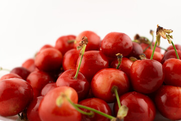 This delightful shot captures a generous pile of fresh, ripe cherries, evoking pure natural sweetness and seasonal joy. Perfect for food photography, healthy recipes, or farmers' market promotions
