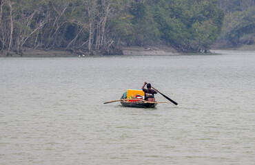 000small fishing boat in the sundarbans.this photo was taken from sundarbans,Bangladesh.