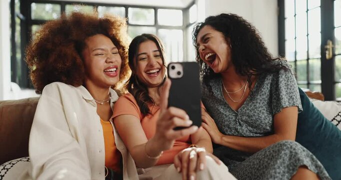 Group, people and laugh with phone at house for gossip, social media post and meme website. Smile, friends and mobile app for streaming funny video, sharing memory and reading notification at reunion