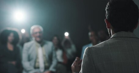 Presentation, politician and person with motivation for crowd, speaker and public speaking on stage. Press conference, legislator and announcement for audience in official event, talking and back