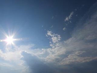 Rays of sun bursting into the sky, highlighting the storm clouds below. Skies above Kent County,...