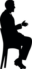 Silhouettte of Man sitting on chair.