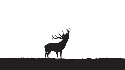 Silhouette of a Male Deer with Antlers Standing Alone in Wilderness