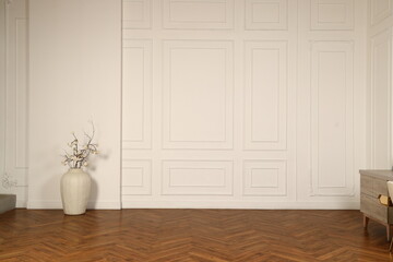 An Elegant and Minimalist Interior featuring a Textured Wall complemented by a Wooden Floor