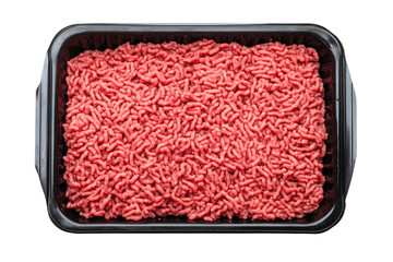 Fresh raw ground beef in a black tray against a dark background in a close up