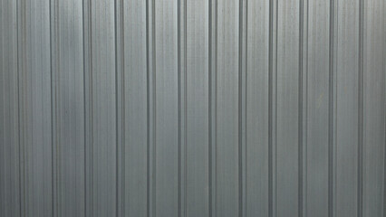 Silver metal sheet wall of factory, shiny metal wall texture, warehouse wall, texture, and background image.