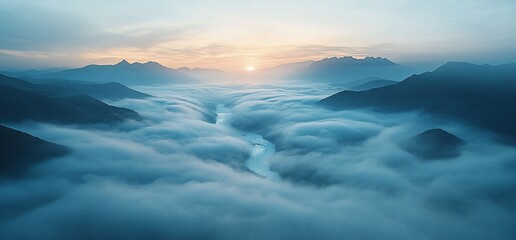 Fototapeta premium Mystical sunrise over the mountains with fog and winding river view