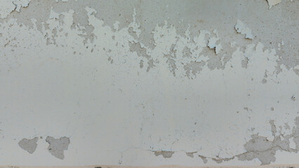 Peeling and scuffing white painted wall texture. Old white building wall texture. Texture and...