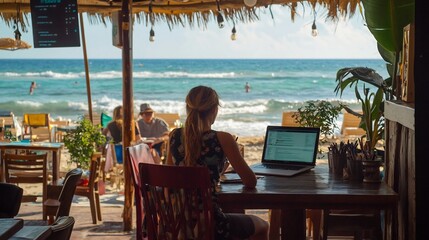 Digital nomad working from a beachside caf laptop relaxed business environment