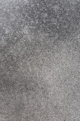 Texture of gray concrete surface with subtle variations observed during daylight